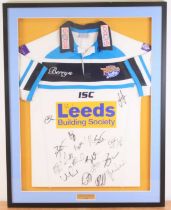 Rugby Union, a multi signed Leeds Rhinos shirt for the 2014 season, mounted for display, 72 x 94cm ,
