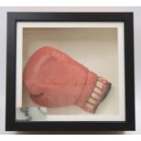 Charlie Magri, a Title right hand red leather boxing glove inscribed in biro "To Toby Good Luck