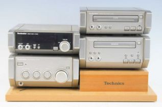 A Technics seperates stereo system, in silver finish to include Stereo Amplifier SE-HD55, Tuner ST-
