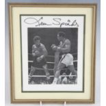 Boxing, Leon Spinks (1953-2021) and Muhammad Ali (1942-2016), a black and white photograph of the