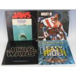 A collection of various LPs, mainly being motion picture soundtrack albums, to include Star Wars,