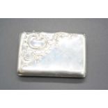 A continental white metal and embossed pocket cigarette case, having gilt washed interior, 2.4oz,
