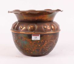 An early 20th century copper jardiniere, repoussee decorated, height 18cm