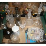 A collection of glassware to include an hour glass decanter