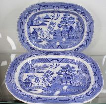 A graduated set of two Staffordshire pearlware Willow pattern meat plates, largest 36x44cm, together