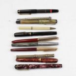A collection of assorted fountain and ballpoint pens, to include Conway Stewart No.84 and Waterman