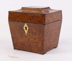 A George III burr walnut tea caddy of sarcophagus form, having a kite shaped ivory escutcheon, the