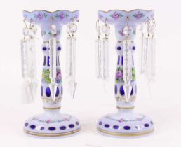 A pair of Victorian blue and white overlaid glass table lustres, each height 26cm One has a chip