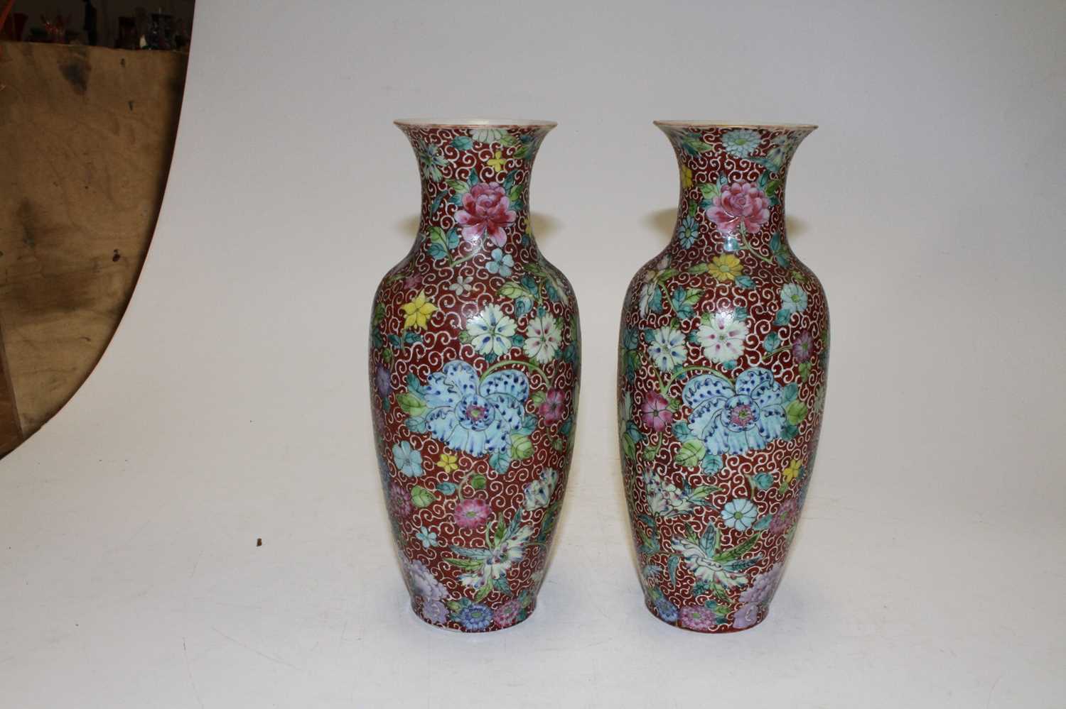 A pair of Chinese porcelain vases, each enamel decorated with flowers, four character seal mark to - Image 3 of 5