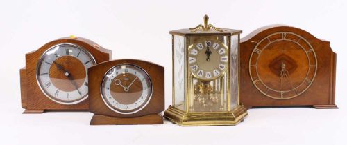 An early 20th century walnut cased mantel clock, height 21.5cm together with three others similar