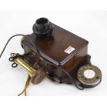 A vintage style oak cased rotary telephone
