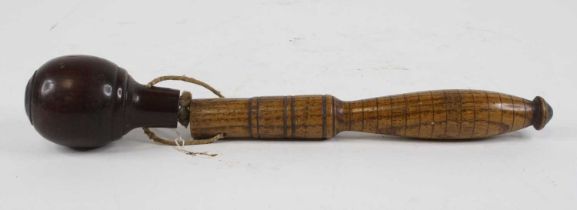 A turned wood cosh, 30cm