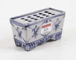 A 20th century Delft type flower brick, width 12cm