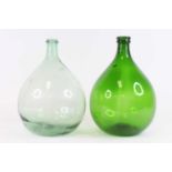 A near pair of glass carboys, height 36cm