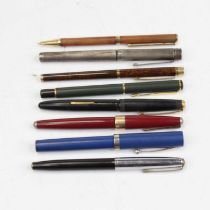 A Sheaffer fountain pen, having a Sheaffer nib with blue cap and barrel, with white metal band;