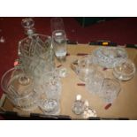 A collection of glassware to include a cut glass decanter and tumblers