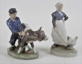 A pair of Royal Copenhagen porcelain figures, the largest h.19.5cm Both figures appear to be in good