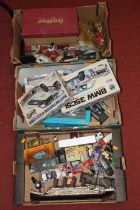 Three boxes of toys and models, to include a Tamiya Martini Porsche 935 Turbo kit and other