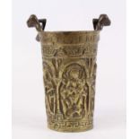 A brass Holy Water pail, probably 18th century, relief decorated with religious scenes, height 21.