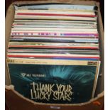 A collection of vintage LPs to include Nat King Cole, Hank Williams, and classical