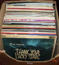 A collection of vintage LPs to include Nat King Cole, Hank Williams, and classical