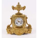A late 19th century French gilt bronze 8-day mantel clock, the enamel dial with Roman numerals and