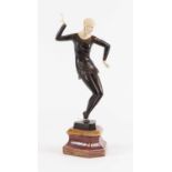 After Ferdinand Preiss, an Art Deco style bronzed spelter and resin figure of a dancer, upon a