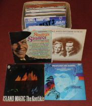 A collection of LPs including Lionel Hampton, Frank Sinatra, and classical