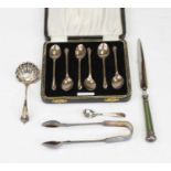 A set of six Elizabeth II silver coffee bean spoons in fitted case; together with a silver salt