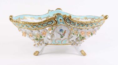 A 20th century Dresden porcelain table basket, having floral encrusted decoration, width 44cm Some
