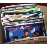 A collection of vintage LPs to include The Thompson Twins, Elvis Presley and The Stray Cats