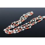 A white metal cultured pearl and coral set long necklace, 145cm