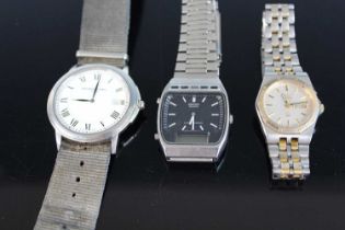 A Raymond Weil gent's steel cased quartz wristwatch; together with two Seiko quartz wristwatches (