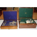 An early 20th century oak cased part canteen of silver plated cutlery in the Old English pattern,