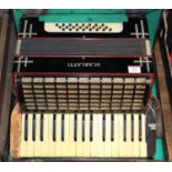 A vintage Scarlatti piano accordion, cased