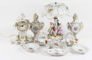 A collection of Dresden floral encrusted porcelain, to include a pair of pot pourri, h.25cm, and a