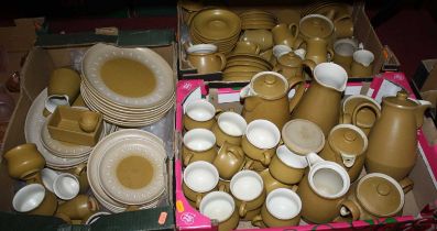 A collection of Denby yellow glazed stoneware tea and dinner wares