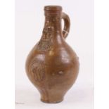 An 18th century German stoneware Bartmann jug, height 22cm Restored