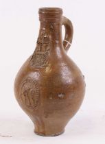 An 18th century German stoneware Bartmann jug, height 22cm Restored