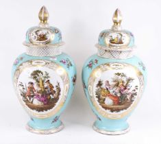 A pair of large Dresden porcelain vases and covers, each decorated with figures in 18th century