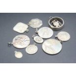 Ten various silver St Christopher pendants, gross weight 53g