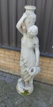 A contemporary painted and reconstituted stone garden statue, modelled as a robed female water-