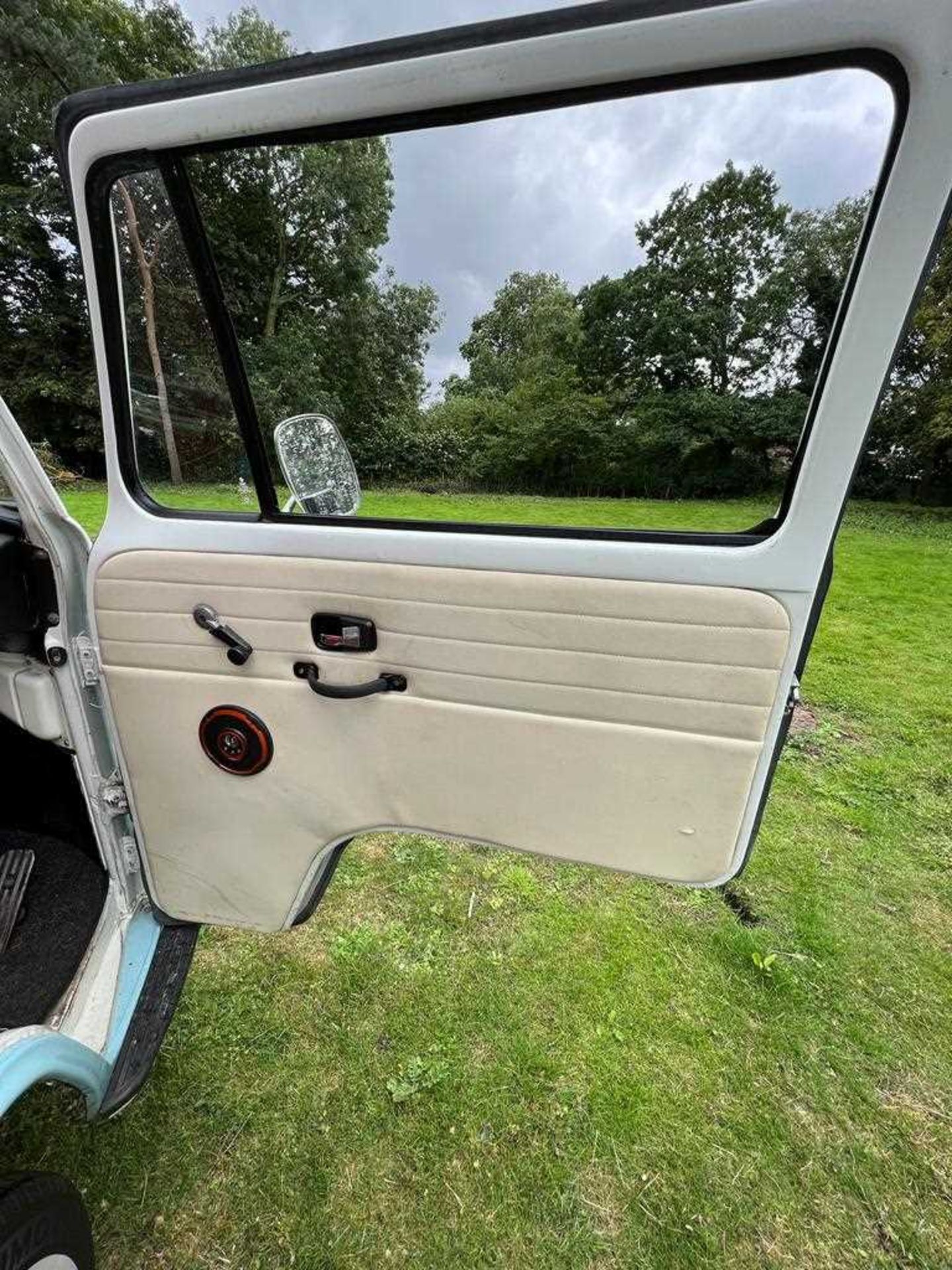 A 1972 VW Type 2 Westfalia Crossover camper van together with a 1971 Eriba Familia Caravan, both - Bild 58 aus 64