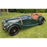 A 2011 Morgan 4/4 W12 V3 two seater Roadster in dark green with tan interior Registration CJ13 (