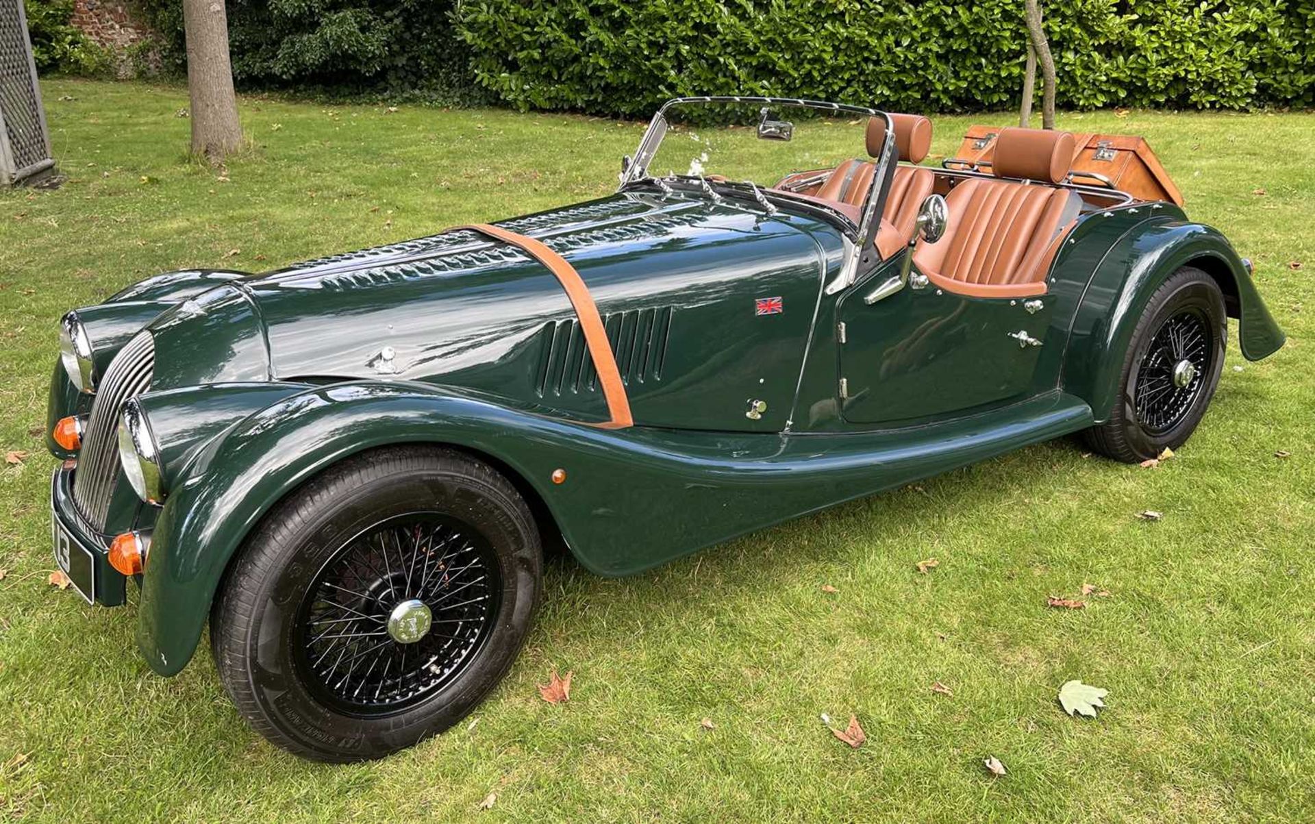 A 2011 Morgan 4/4 W12 V3 two seater Roadster in dark green with tan interior Registration CJ13 (