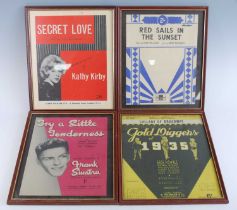 A collection of framed music scores mainly from the 1960's, to include You'll Never Walk Alone, Take