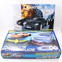 A Scalextric boxed gift set group to include a Porsche Powerslide together with a Micro Scalextric