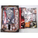 A collection of Star Wars modern release action figures, trading figures, cards and pin badges, to