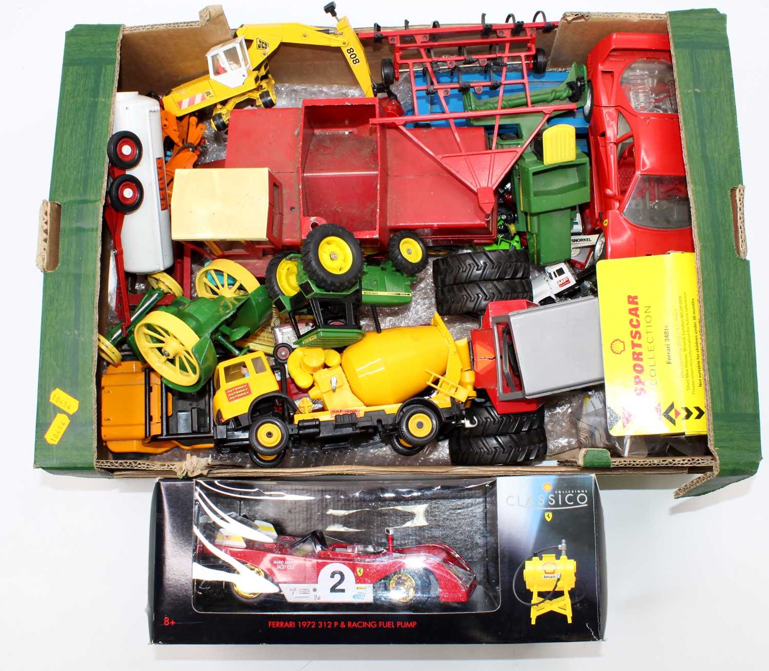 A tray containing a collection of mixed play-worn farming and construction diecast toys including