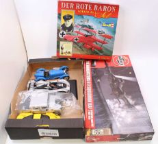 A collection of four loose 1/18 scale diecast vehicles to include a Maisto Audi R8R Le Mans 1999
